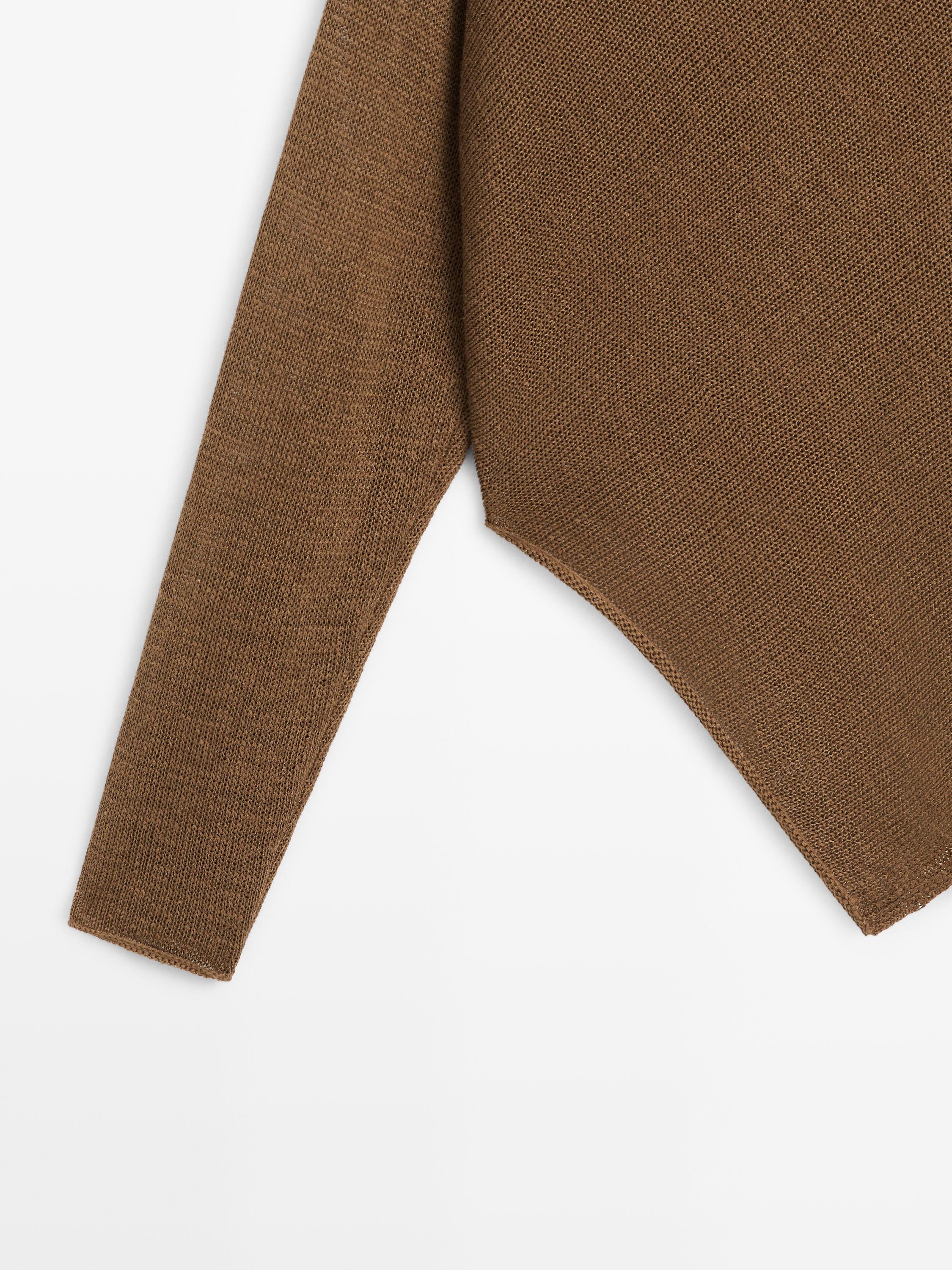 Asymmetric knit cape sweater